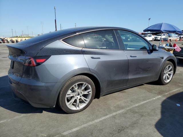 Photo 3 from auction – 2023 TESLA MODEL Y with VIN 7SAYGDED7PF949576
