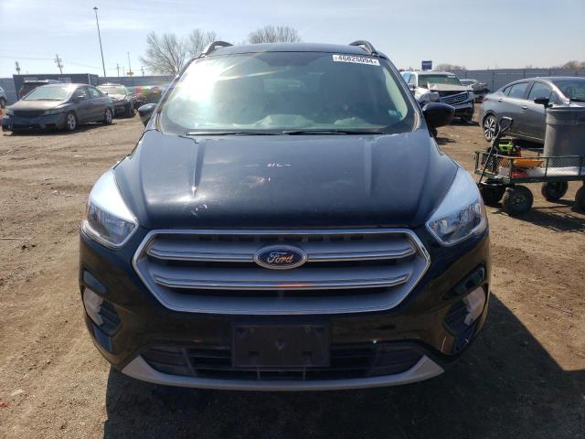 Photo 5 from auction – 2018 FORD ESCAPE SE with VIN 1FMCU9GD8JUC48128