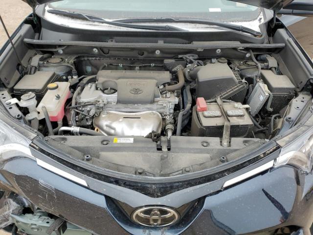 Photo 11 from auction – 2018 TOYOTA RAV4 LE with VIN 2T3BFREV9JW722998