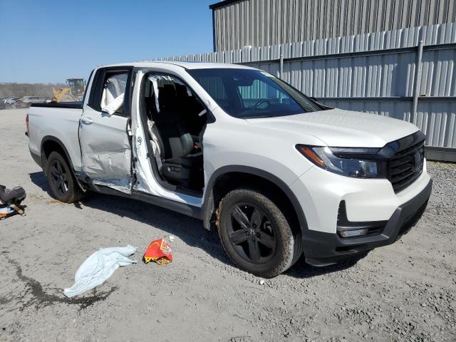 Photo 4 from auction – 2022 HONDA RIDGELINE with VIN 5FPYK3F87NB004557