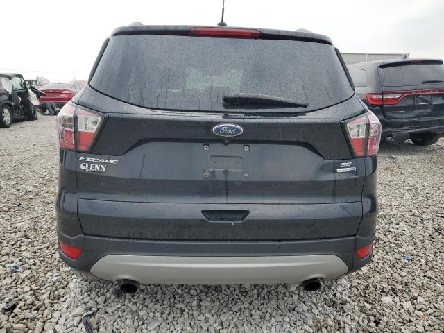 Photo 6 from auction – 2017 FORD ESCAPE SE with VIN 1FMCU9GD4HUD82807