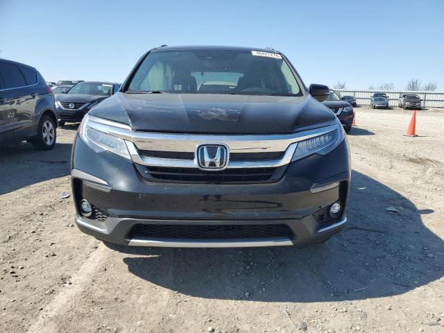 Photo 5 from auction – 2021 HONDA PILOT TOUR with VIN 5FNYF5H67MB041899