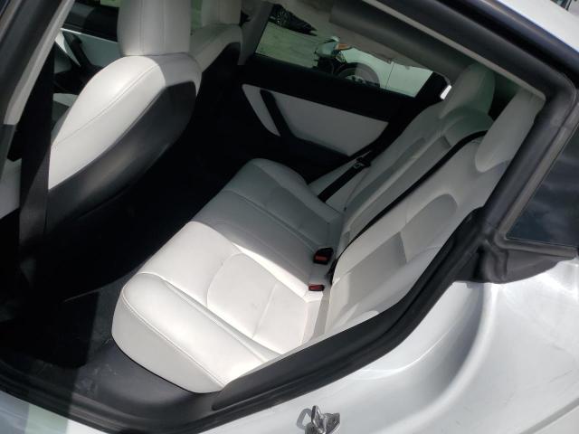 Photo 10 from auction – 2021 TESLA MODEL 3 with VIN 5YJ3E1EA3MF928821