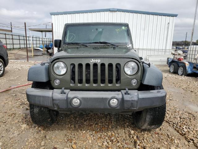 Photo 5 from auction – 2015 JEEP WRANGLER U with VIN 1C4BJWDG0FL696429