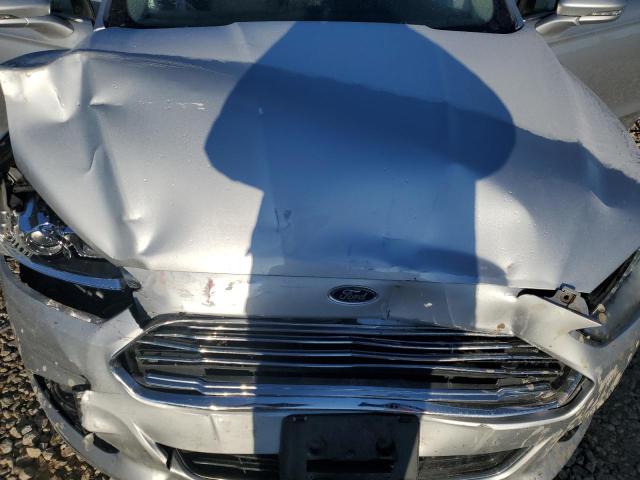 Photo 11 from auction – 2016 FORD FUSION TIT with VIN 3FA6P0D99GR355361