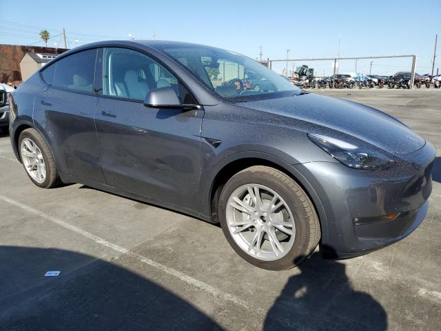 Photo 4 from auction – 2023 TESLA MODEL Y with VIN 7SAYGDED7PF949576