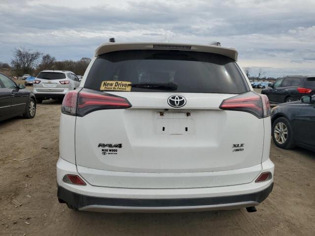 Photo 6 from auction – 2017 TOYOTA RAV4 XLE with VIN JTMRFREV6HD210430
