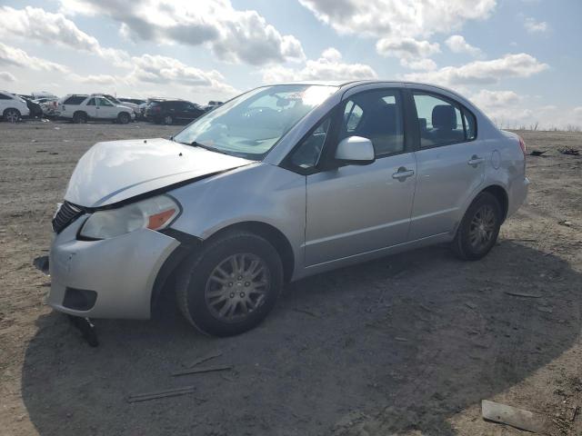 SUZUKI SX4 LE 2012 مع رقم تعريف المركبة JS2YC5A31C6303991 - صورة من المزاد