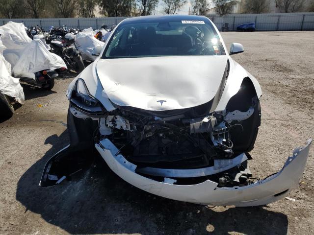 Photo 5 from auction – 2021 TESLA MODEL 3 with VIN 5YJ3E1EA4MF053071