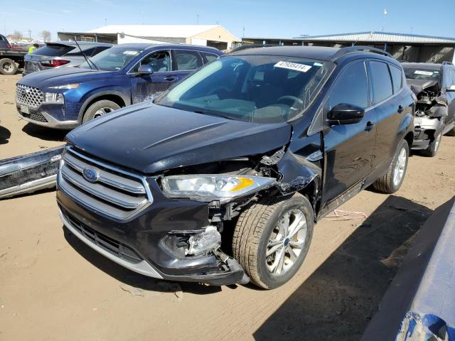 FORD ESCAPE SE 2017 with VIN 1FMCU9GDXHUE75654 - Photo from auction