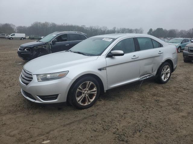 FORD TAURUS SEL 2014 with VIN 1FAHP2E89EG139556 - Photo from auction