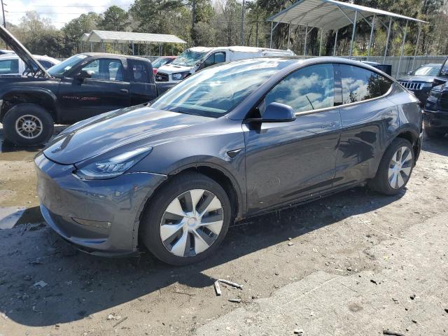 TESLA MODEL Y 2021 with VIN 5YJYGAEEXMF298153 - Photo from auction