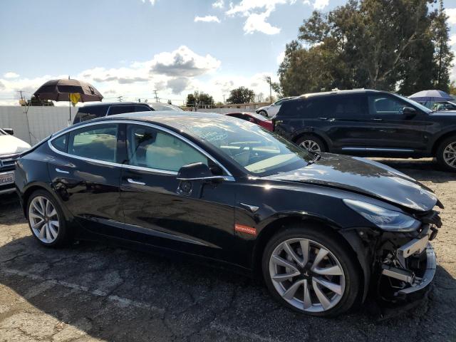 Photo 4 from auction – 2020 TESLA MODEL 3 with VIN 5YJ3E1EA5LF649434