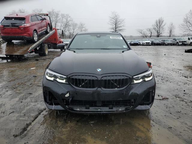 Photo 5 from auction – 2021 BMW 330I with VIN 3MW5R1J0XM8B55860