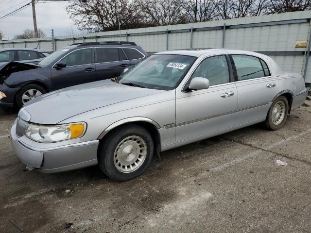 LINCOLN TOWN CAR E 1998 with VIN 1LNFM81W7WY716724 - Photo from auction