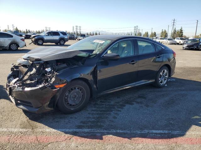 HONDA CIVIC LX 2018 with VIN 2HGFC2F58JH551663 - Photo from auction