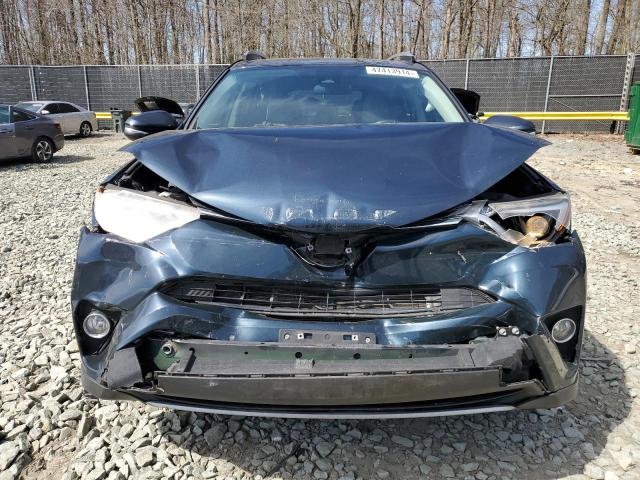 Photo 5 from auction – 2017 TOYOTA RAV4 XLE with VIN JTMRFREV1HJ127523