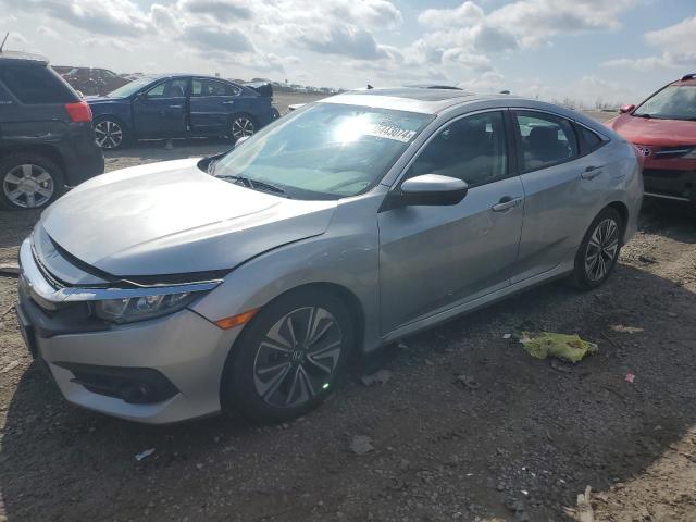 HONDA CIVIC EX 2017 with VIN 19XFC1F34HE003236 - Photo from auction