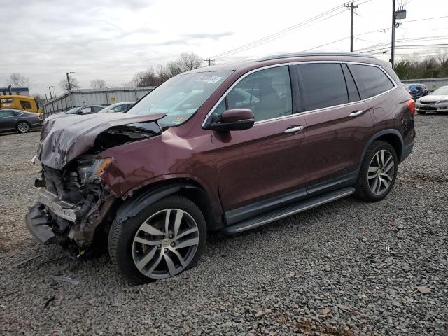 HONDA PILOT TOUR 2017 with VIN 5FNYF6H95HB018949 - Photo from auction