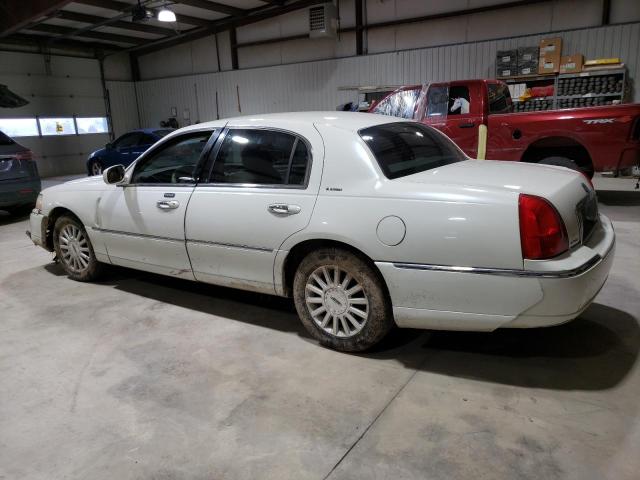 Photo 2 from auction – 2003 LINCOLN TOWN CAR E with VIN 1LNHM81W73Y694678