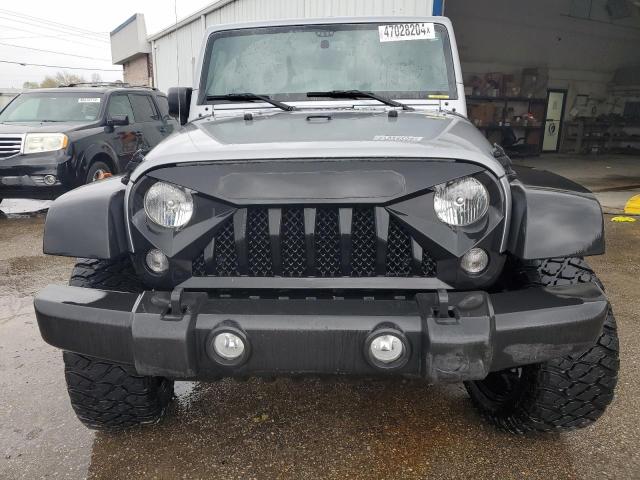 Photo 5 from auction – 2016 JEEP WRANGLER U with VIN 1C4BJWDG2GL200550