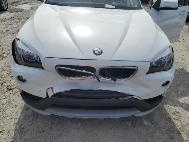 Photo 11 from auction – 2015 BMW X1 SDRIVE2 with VIN WBAVM1C5XFV315419