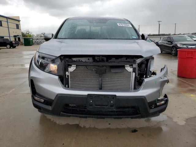 Photo 5 from auction – 2023 HONDA RIDGELINE with VIN 5FPYK3F56PB033153