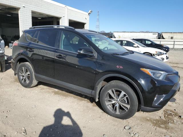 Photo 4 from auction – 2017 TOYOTA RAV4 XLE with VIN 2T3RFREV5HW645233
