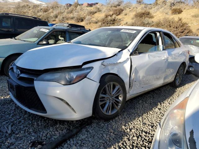 TOYOTA CAMRY LE 2017 with VIN 4T1BF1FK8HU690828 - Photo from auction
