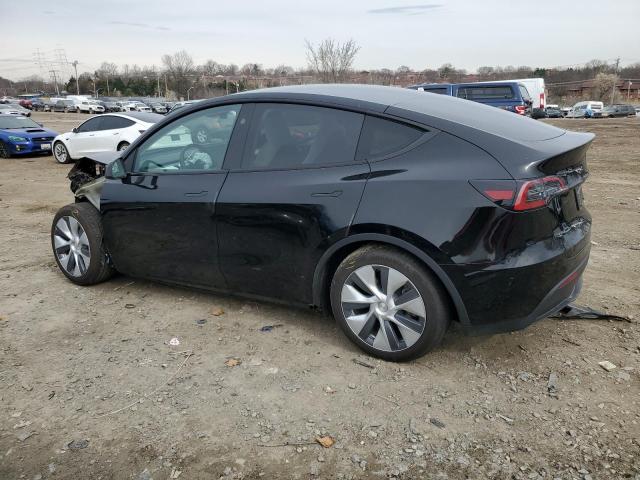Photo 2 from auction – 2023 TESLA MODEL Y with VIN 7SAYGAEE4PF857882