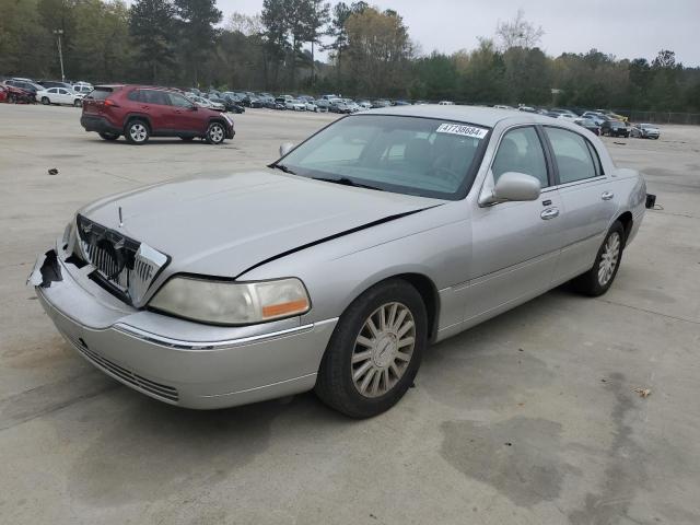 LINCOLN TOWN CAR E 2003 with VIN 1LNHM81W43Y675392 - Photo from auction