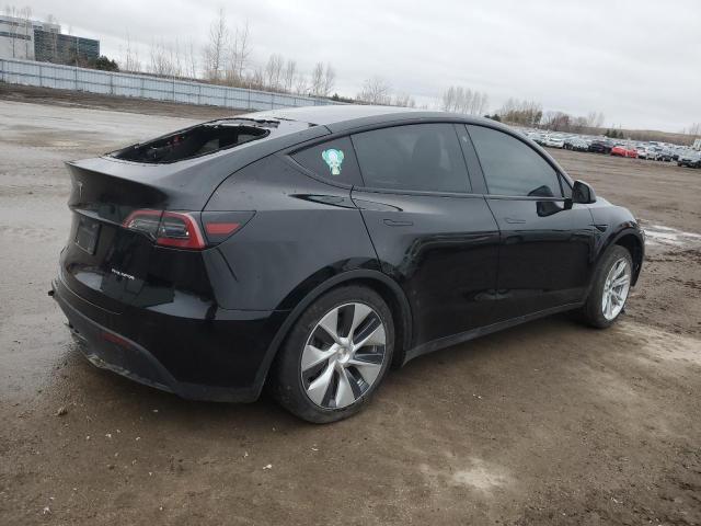 Photo 3 from auction – 2022 TESLA MODEL Y with VIN 7SAYGDEE9NF570536