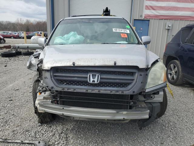 Photo 5 from auction – 2004 HONDA PILOT EX with VIN 2HKYF18424H538660
