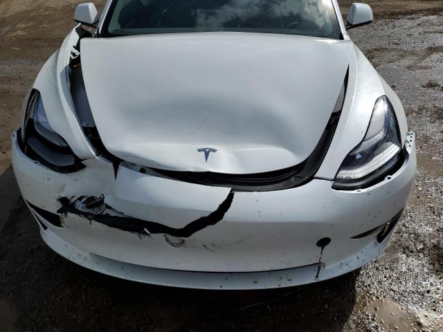 Photo 11 from auction – 2022 TESLA MODEL 3 with VIN 5YJ3E1EA8NF300786