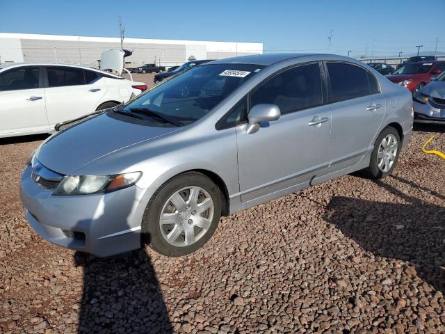 HONDA CIVIC LX 2011 with VIN 2HGFA1F57BH309240 - Photo from auction
