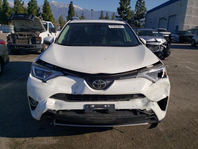 Photo 5 from auction – 2017 TOYOTA RAV4 XLE with VIN JTMWFREV6HD094407