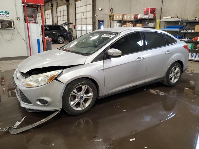 FORD FOCUS SE 2014 with VIN 1FADP3F20EL363157 - Photo from auction