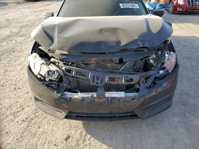 Photo 11 from auction – 2018 HONDA CIVIC EX with VIN 19XFC2F71JE014032