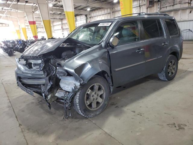 HONDA PILOT TOUR 2010 with VIN 5FNYF4H96AB005234 - Photo from auction