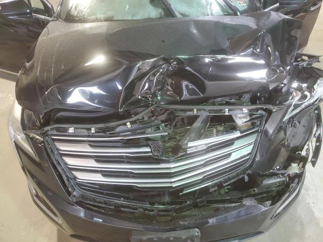 Photo 11 from auction – 2018 CADILLAC XT5 with VIN 1GYKNBRSXJZ123838