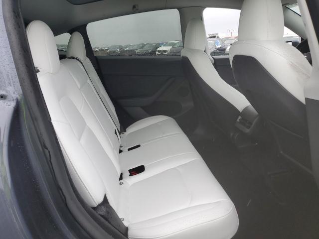Photo 11 from auction – 2023 TESLA MODEL Y with VIN 7SAYGDEE2PF903971
