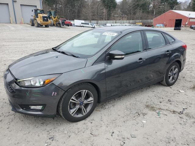 FORD FOCUS SE 2017 with VIN 1FADP3FE1HL269061 - Photo from auction