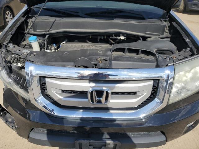 Photo 12 from auction – 2011 HONDA PILOT TOUR with VIN 5FNYF4H98BB035997