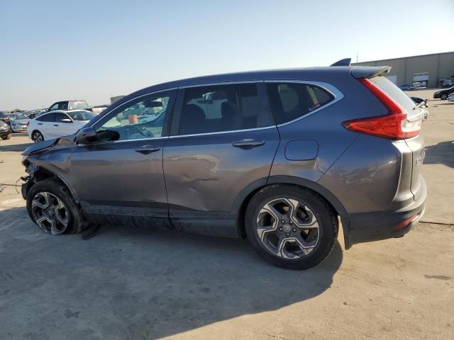 Photo 2 from auction – 2018 HONDA CR-V EX with VIN 7FARW1H57JE010012