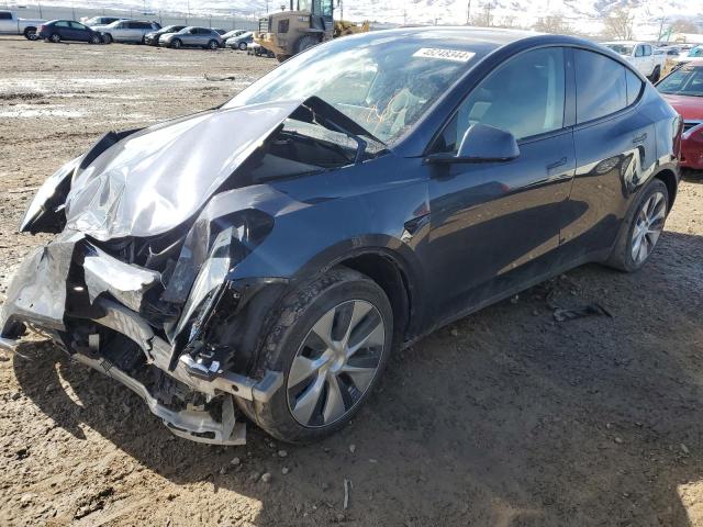 TESLA MODEL Y 2022 with VIN 7SAYGAEE6NF392826 - Photo from auction