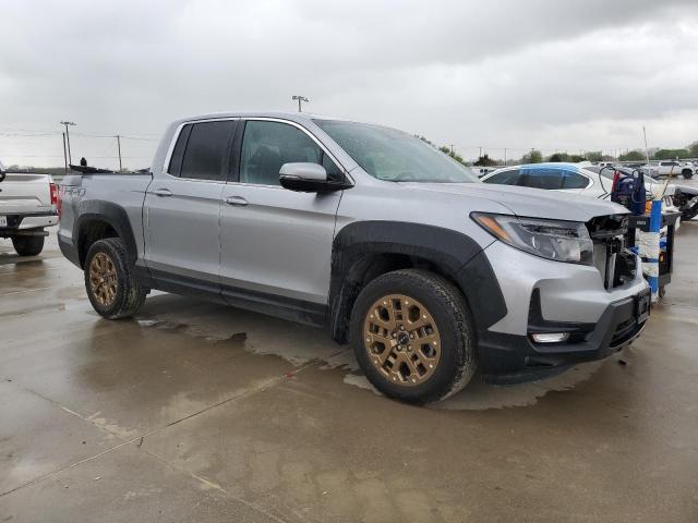 Photo 4 from auction – 2023 HONDA RIDGELINE with VIN 5FPYK3F56PB033153