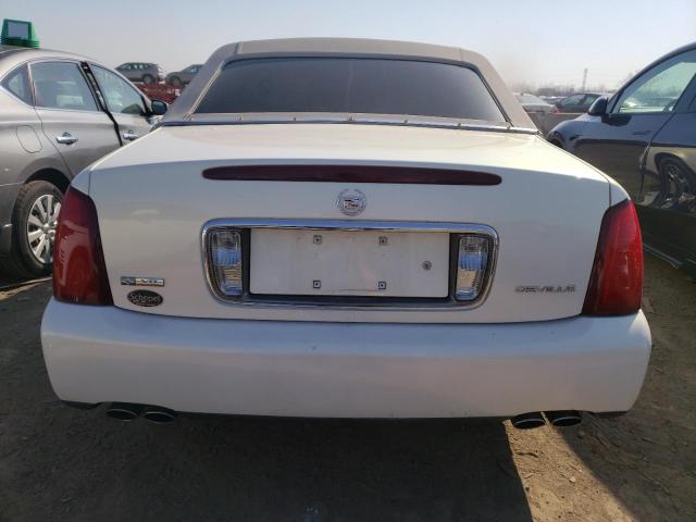 Photo 6 from auction – 2004 CADILLAC DEVILLE with VIN 1G6KD54Y34U154567