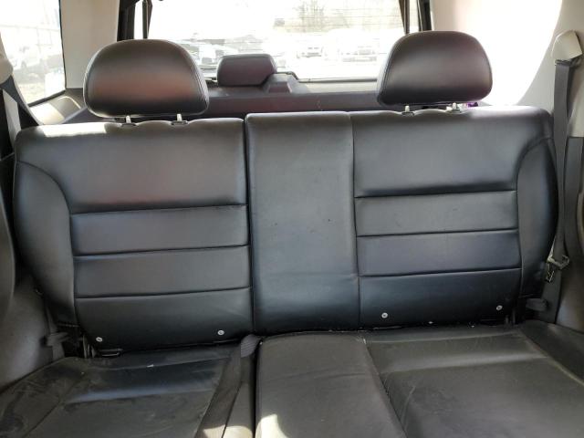 Photo 10 from auction – 2004 FORD ESCAPE LIM with VIN 1FMCU94104KB62807