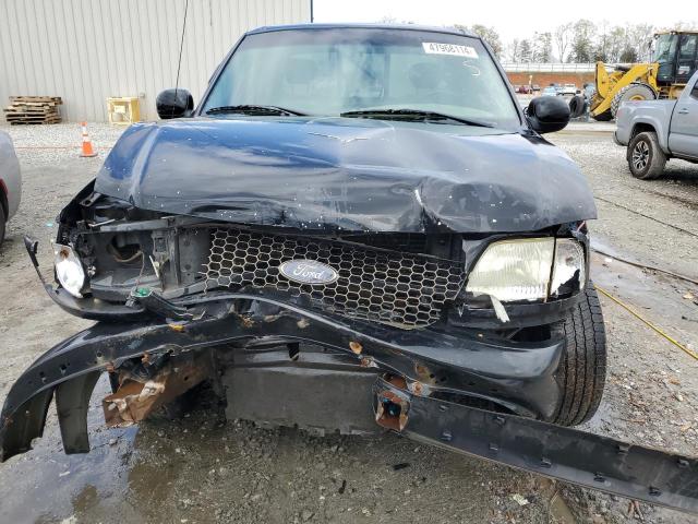 Photo 5 from auction – 2002 FORD F150 with VIN 1FTRX17W22NB98041