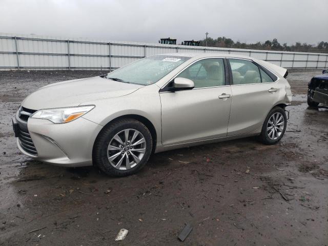 TOYOTA CAMRY LE 2017 with VIN 4T1BF1FK6HU691010 - Photo from auction